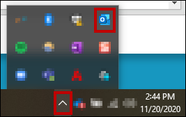 An image of the Outlook icon in the System Tray.
